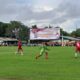 Pertandingan sepak bola antara SMK KPG Merauke dan SMA Eca. Foto-Getty/TN